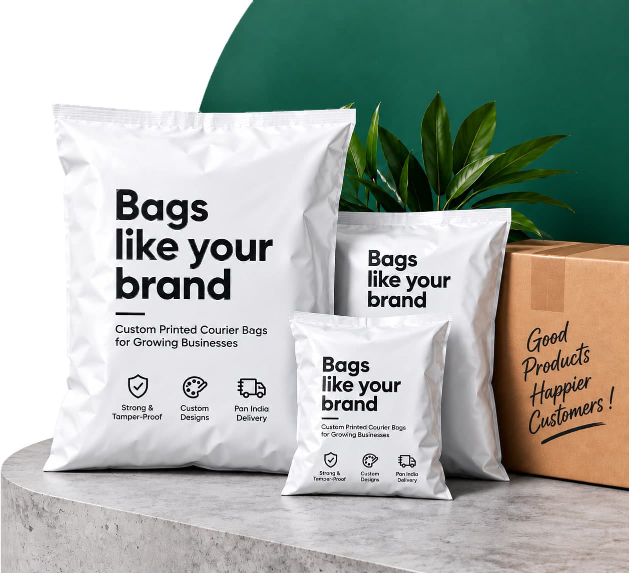 Courier Craft custom printed tamper proof courier bags in three sizes beside a corrugated shipping box